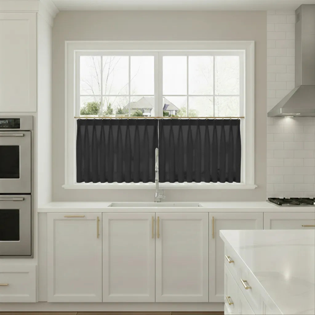 Modern kitchen with black window treatments on a white window
