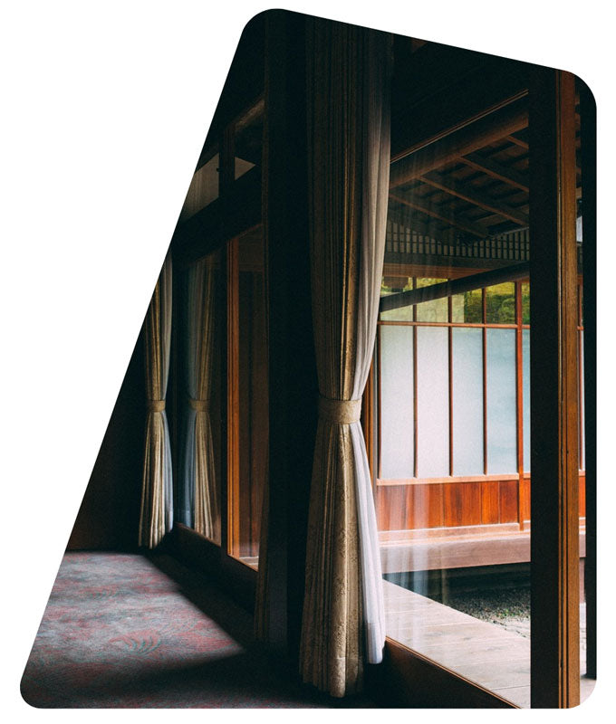 Traditional Japanese room with sliding doors and curtains