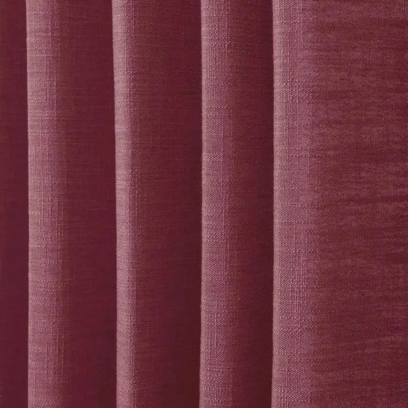 Close-up of textured purple fabric with vertical stripes
