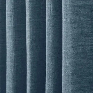 Textured blue fabric with vertical stripes
