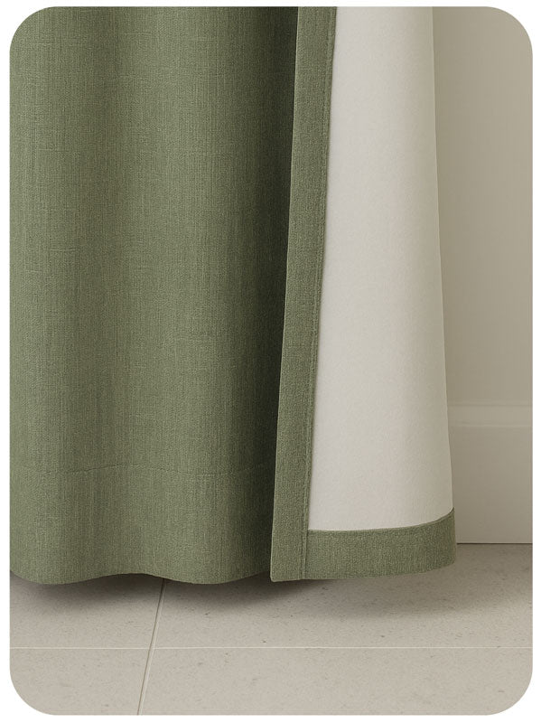 Close-up of green and white curtains on a neutral background