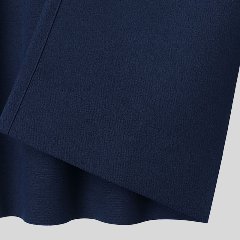 Close-up of a navy blue fabric texture on a light gray background